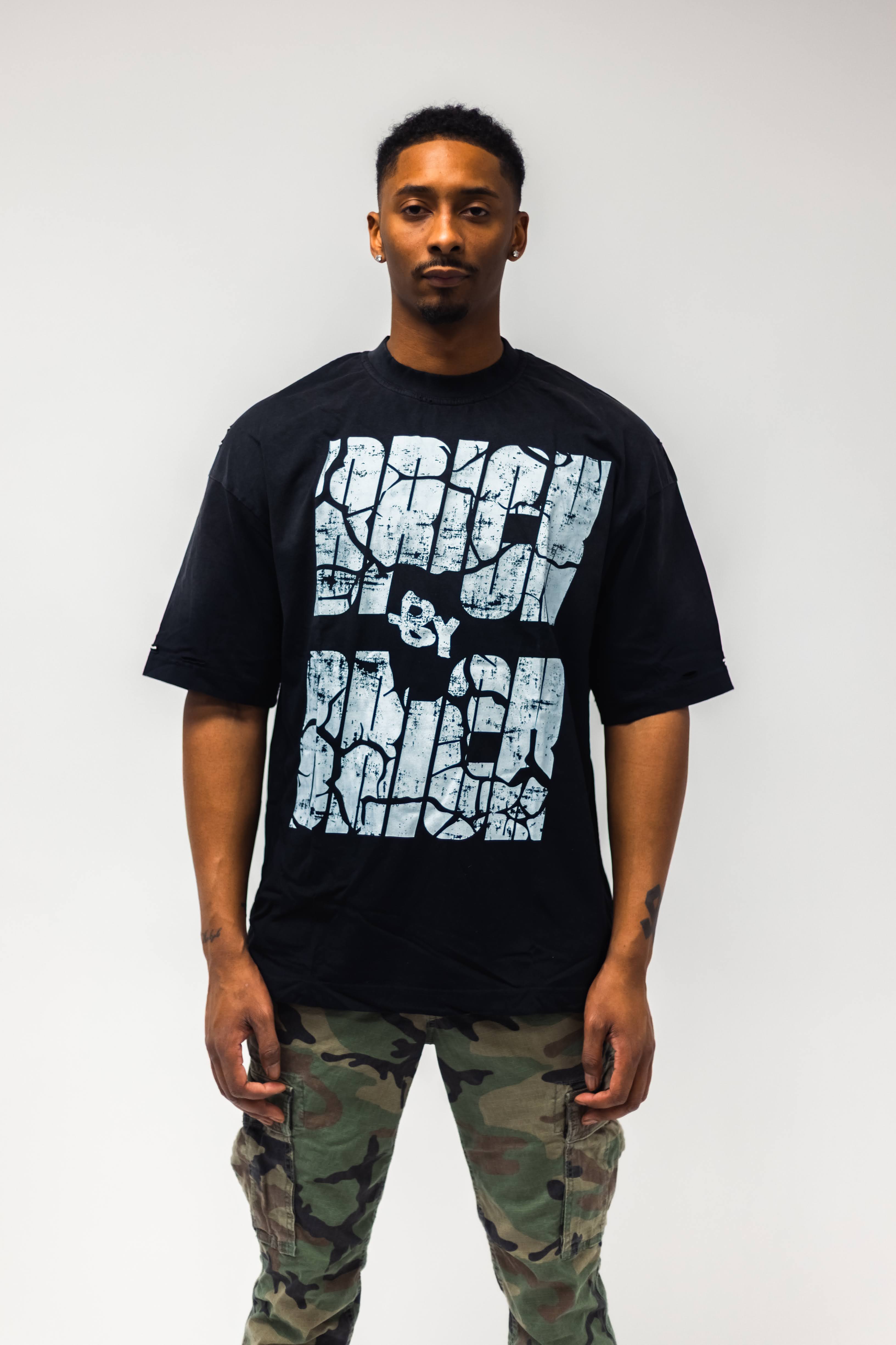 Brick by Brick Tee “You Get What You Put In” Edition – Carry My
